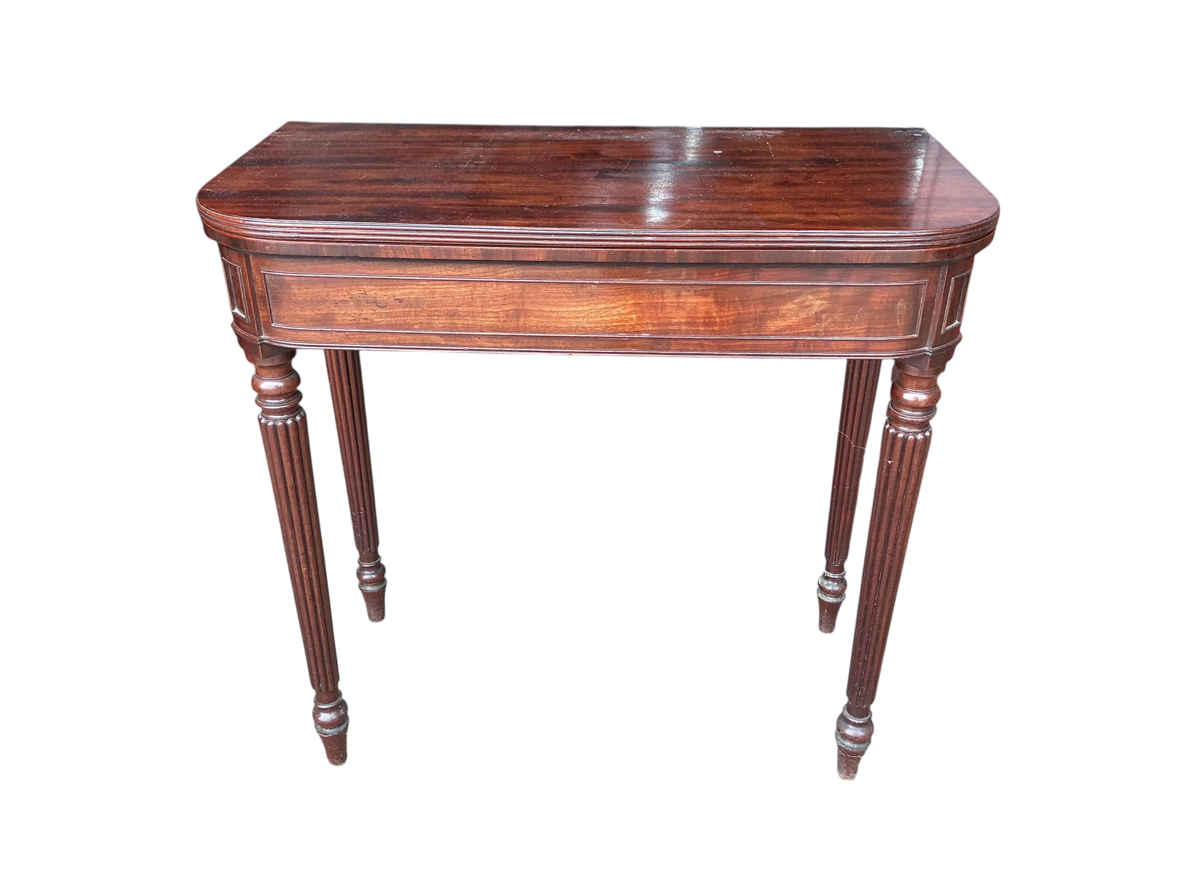 A Regency mahogany D-shaped folding tea table, width 76cm, depth 38cm, height 74cm